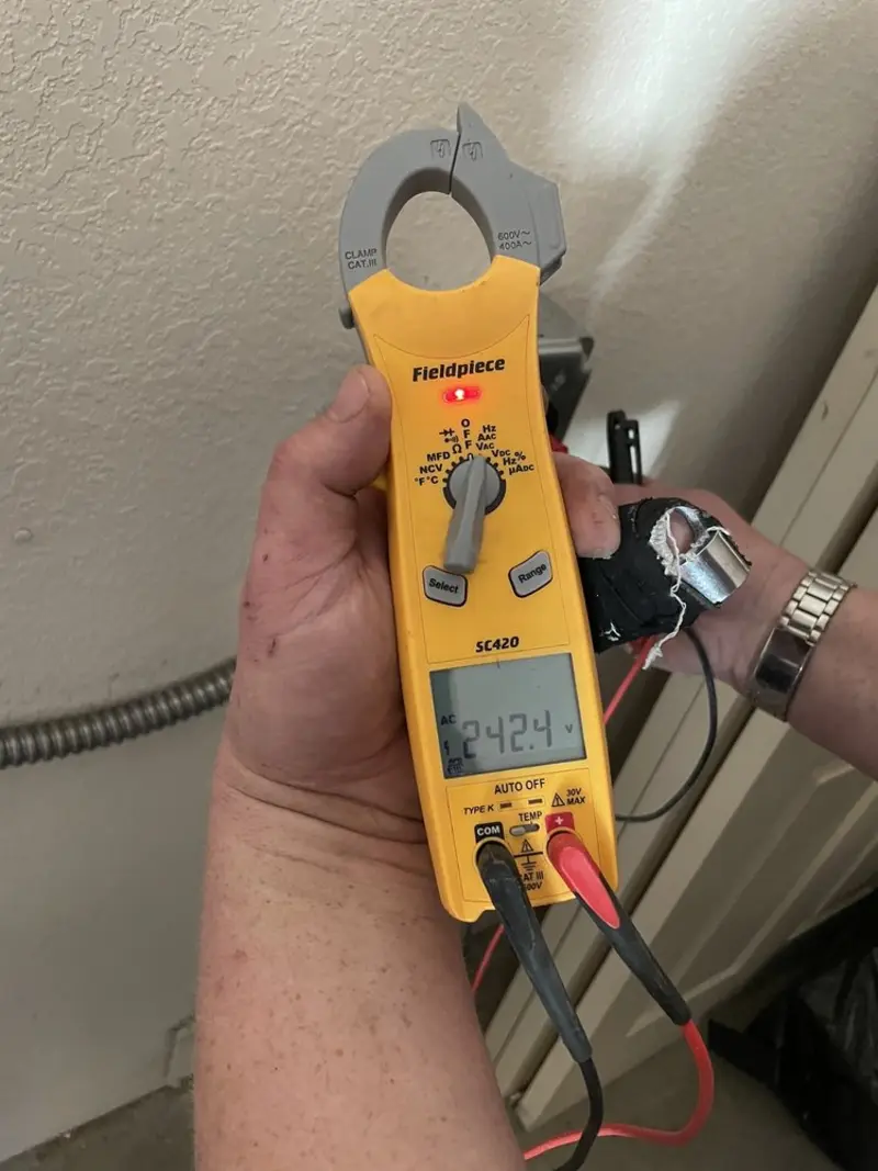 Voltage testing with clamp meter during Aluminum Wiring Replacement in Detroit Lakes